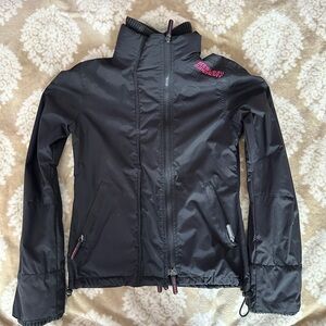 Superdry the windcheater Black Jacket with Pink Logo